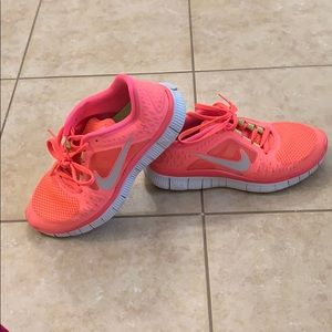 Nike Free Runs in bright coral